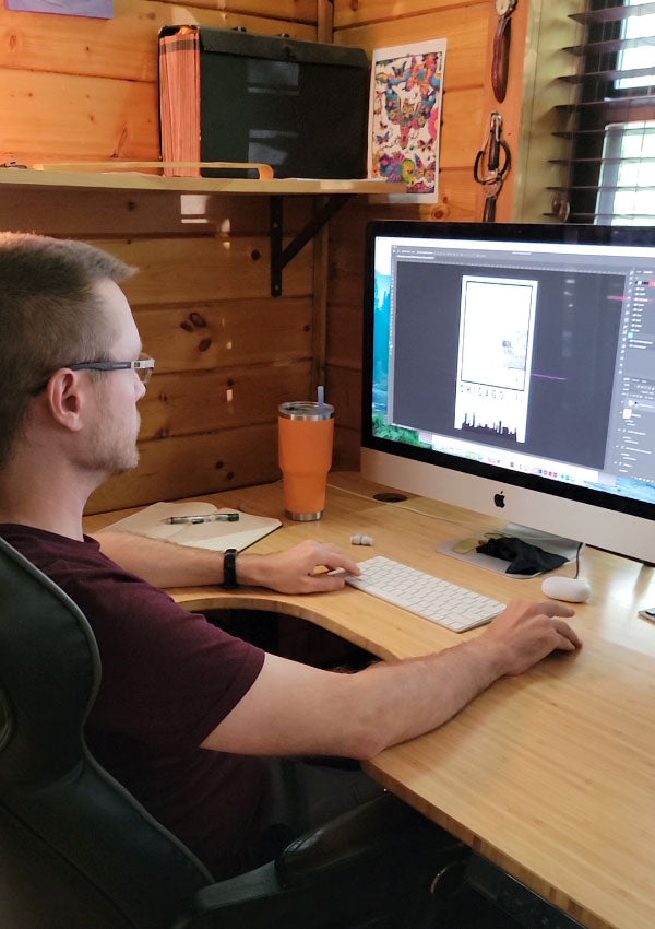 Greg Loebick working on a digital mockup of a custom location wood map from G. Loebick Woodworks