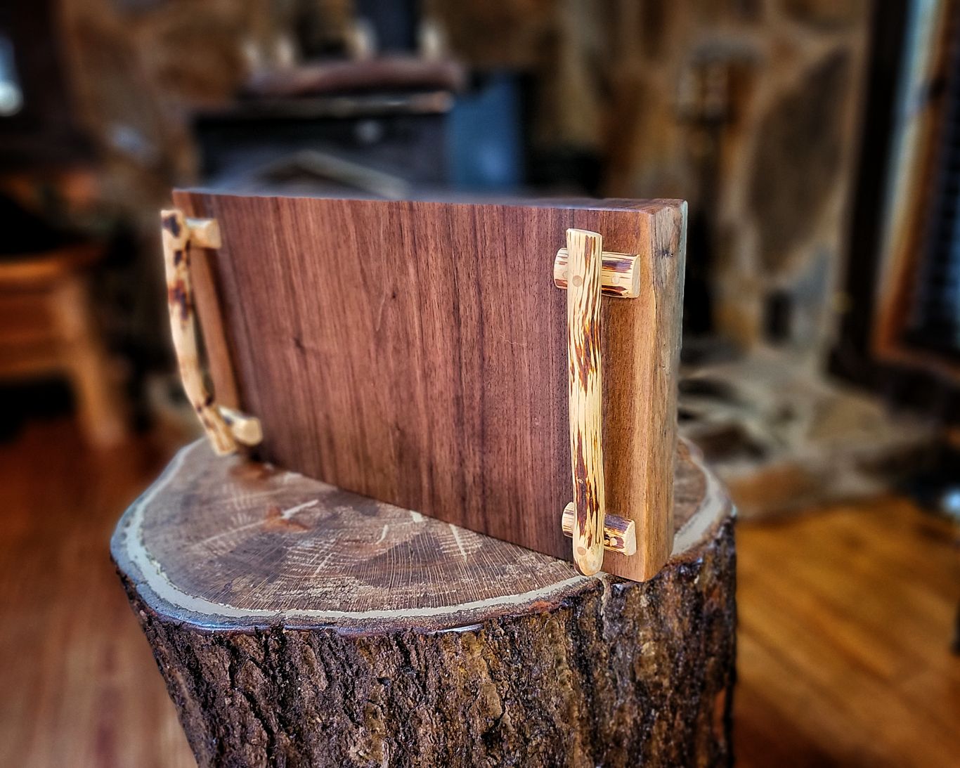 Walnut charcuterie board with mountain laurel handles